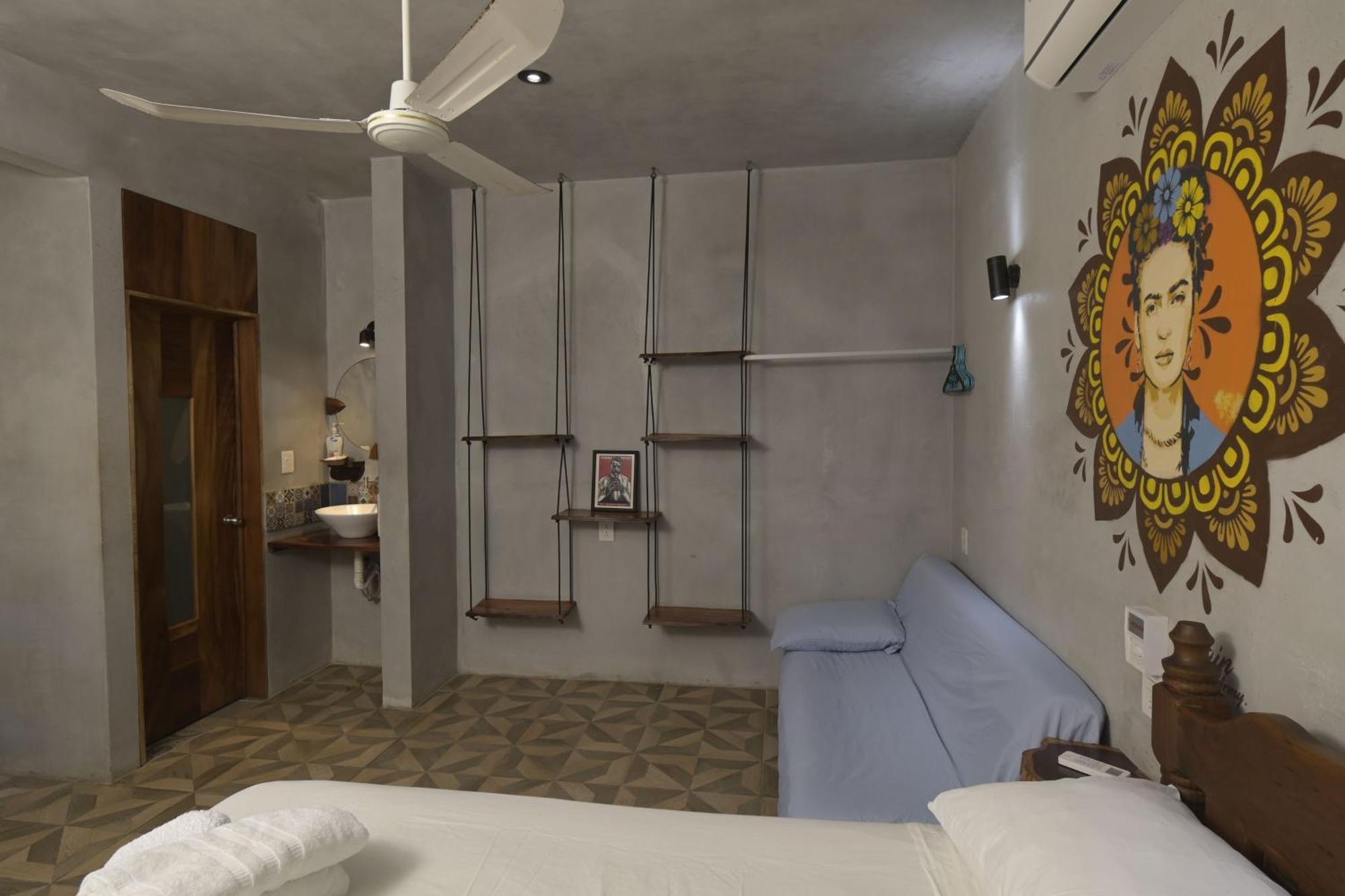 פוארטו אסקונדידו Coccoloba Guest House חדר תמונה