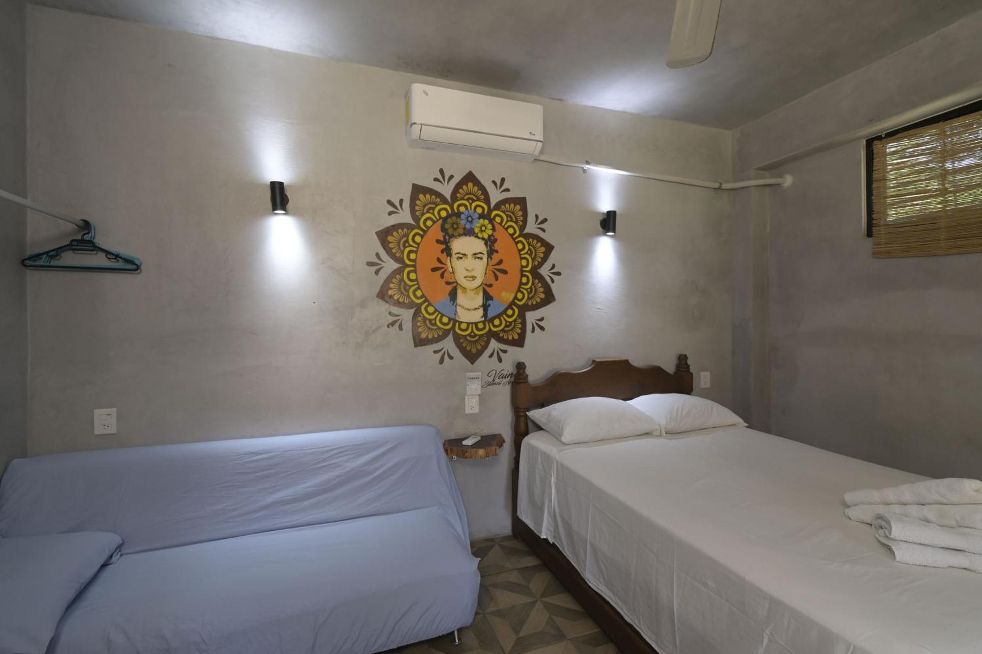פוארטו אסקונדידו Coccoloba Guest House חדר תמונה